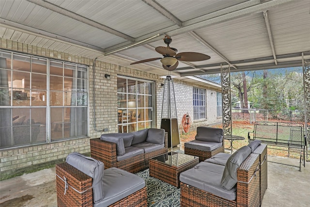 view of patio with ceiling fan and outdoor lounge area