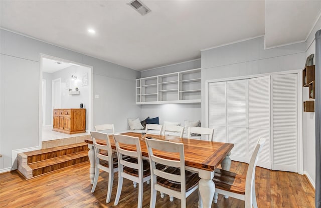 dining area featuring hardwood / wood-style flooring