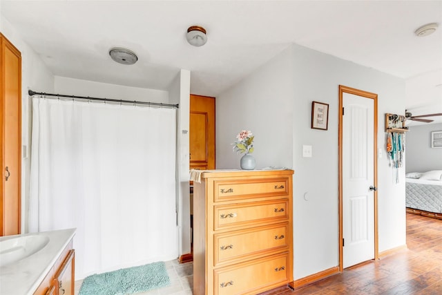 bathroom featuring vanity and hardwood / wood-style flooring