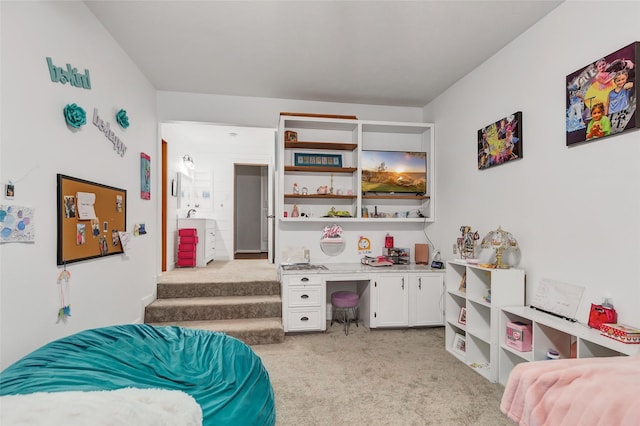 recreation room featuring light carpet