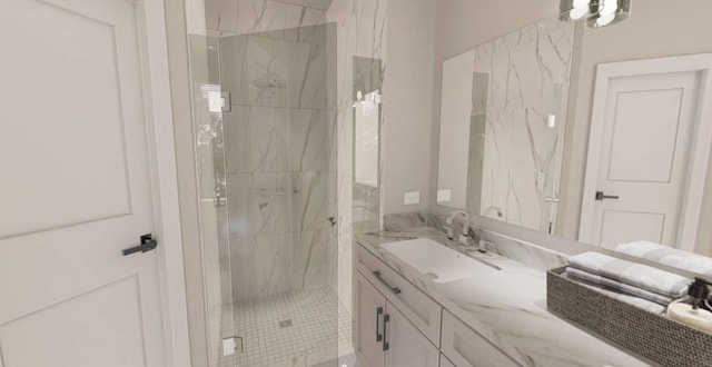 bathroom with vanity and a shower with shower door