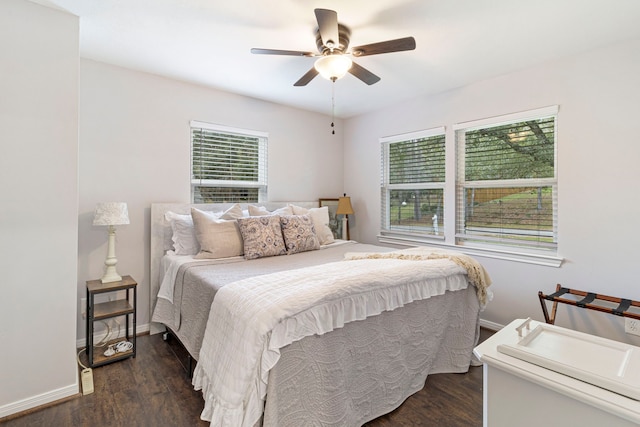 bedroom featuring ceiling fan and dark hardwood / wood-style flooring