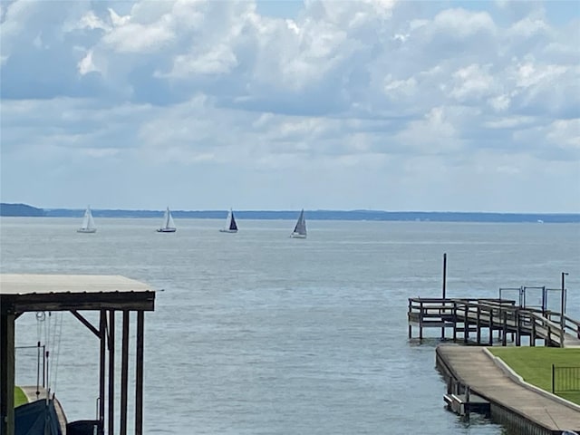 dock area featuring a water view