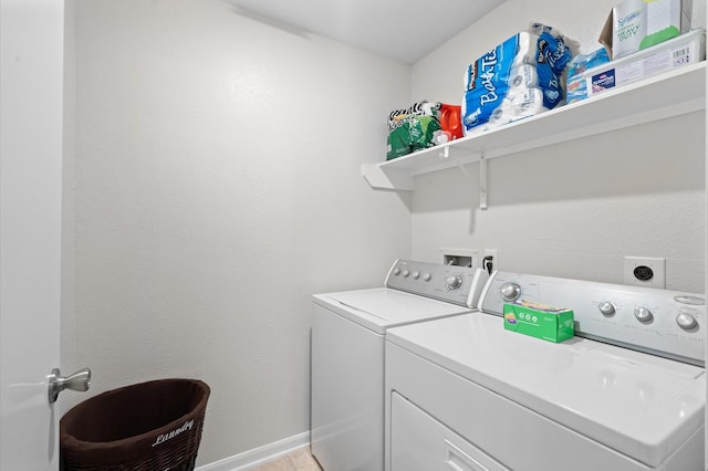 laundry room with separate washer and dryer