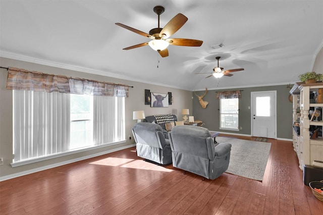 living room with ceiling fan, dark hardwood / wood-style flooring, vaulted ceiling, and crown molding