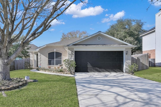 ranch-style house featuring a front yard and a garage