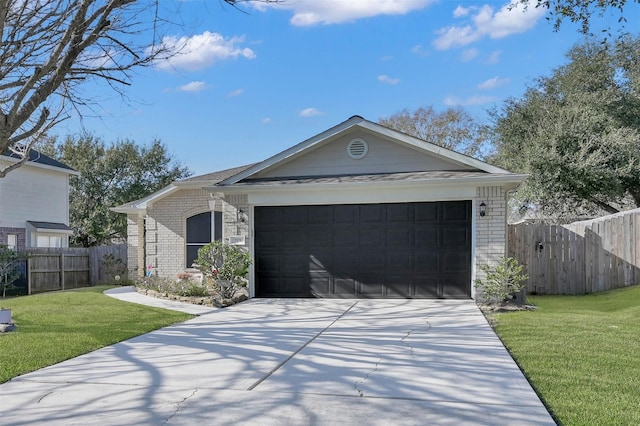 single story home featuring a front lawn and a garage