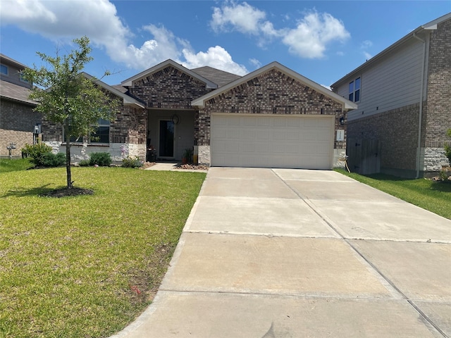 view of front facade featuring a garage and a front lawn