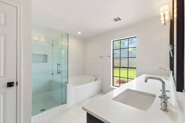 bathroom featuring vanity, tile patterned flooring, and independent shower and bath