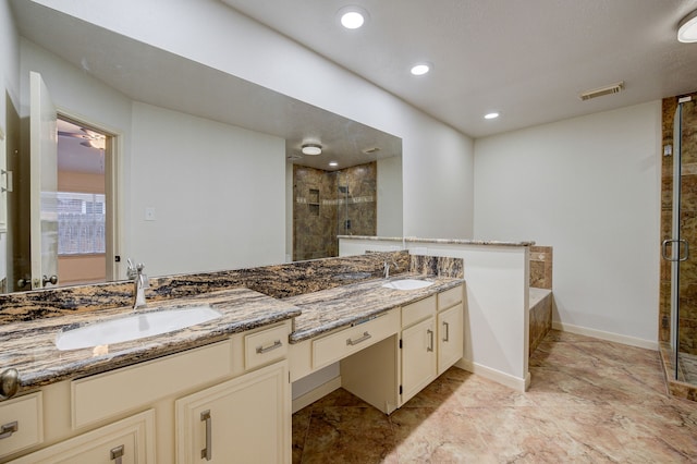 bathroom featuring plus walk in shower and vanity