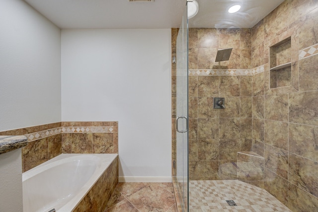 bathroom featuring plus walk in shower