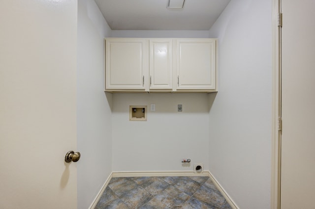 washroom with electric dryer hookup, hookup for a washing machine, cabinets, and hookup for a gas dryer