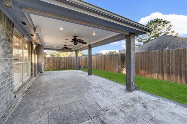 view of patio / terrace featuring ceiling fan