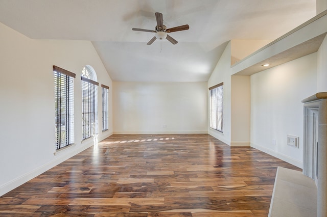 spare room featuring lofted ceiling, ceiling fan, and dark hardwood / wood-style flooring