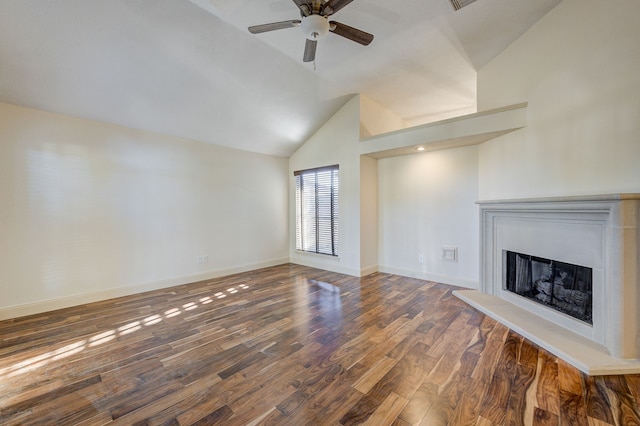 unfurnished living room with lofted ceiling, ceiling fan, and dark hardwood / wood-style flooring