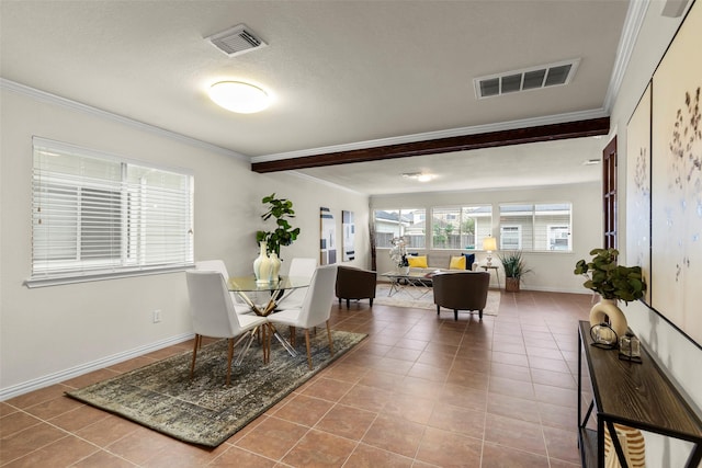 living area with crown molding and tile patterned floors