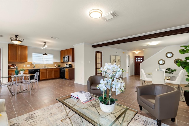 tiled living room featuring crown molding