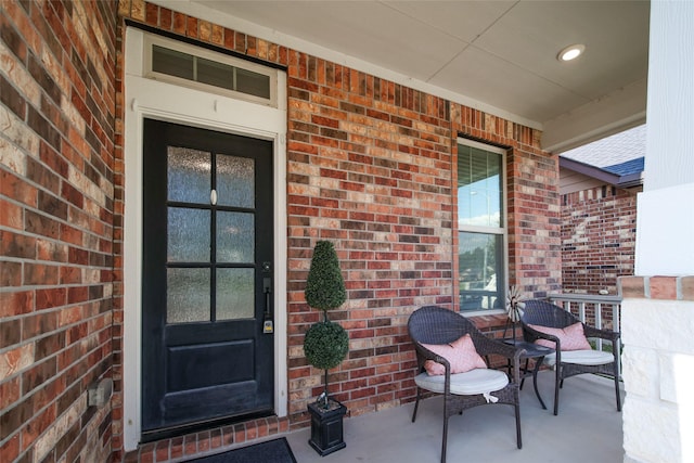 property entrance featuring covered porch