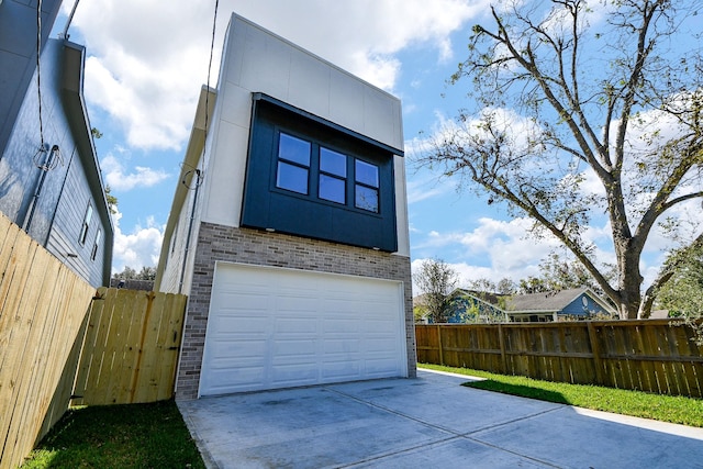 view of property exterior with a garage