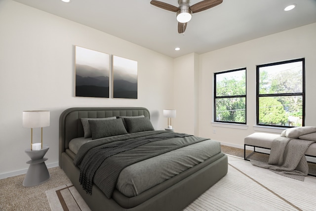 carpeted bedroom featuring ceiling fan