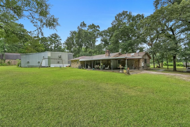 view of yard with a carport