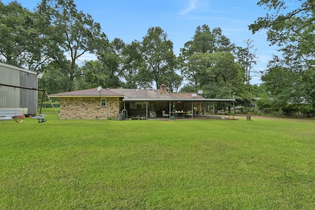 view of yard with a carport