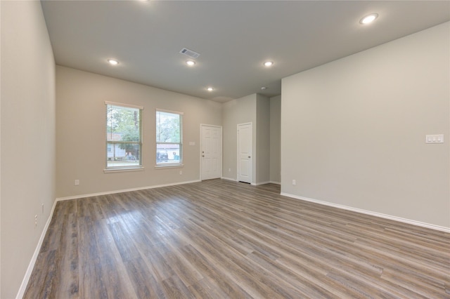 empty room featuring wood-type flooring