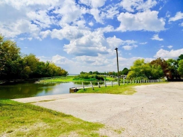 view of property's community with a water view