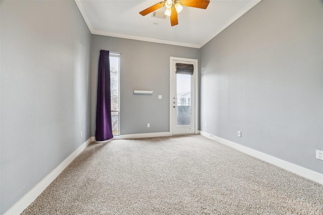 unfurnished room featuring ceiling fan, crown molding, and carpet flooring