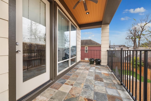 balcony featuring ceiling fan