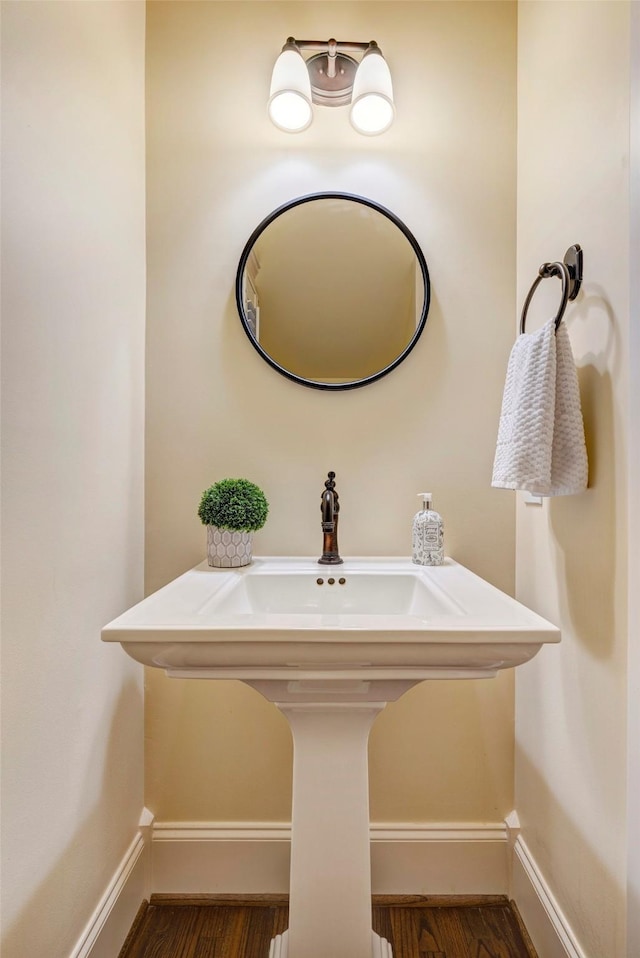 bathroom with wood-type flooring