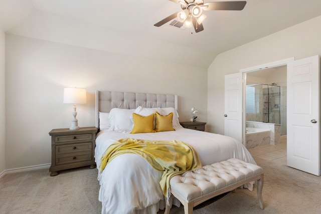 carpeted bedroom featuring ensuite bathroom and ceiling fan