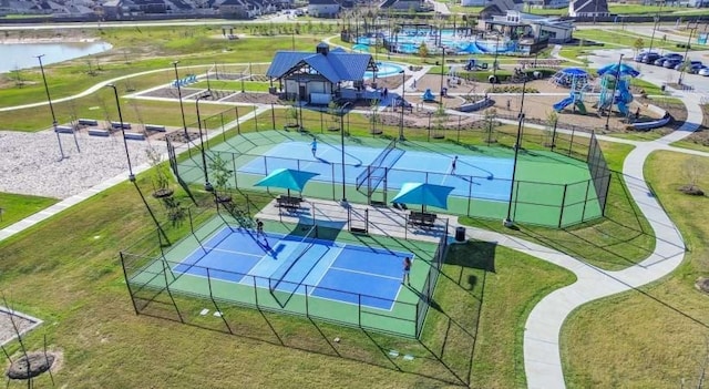 birds eye view of property featuring a water view