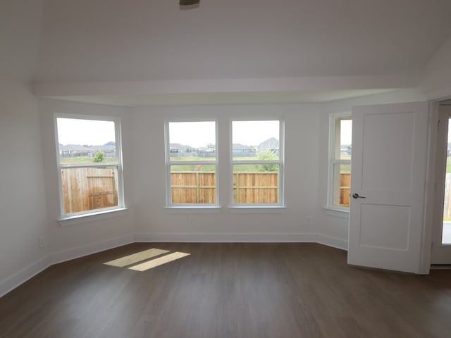 597 Copper Springs Dr, Magnolia, TX 77354 - empty room with dark wood-type flooring and baseboards