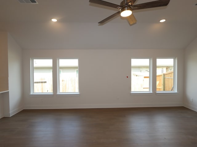 597 Copper Springs Dr, Magnolia, TX 77354 - empty room featuring dark wood-style flooring, baseboards, recessed lighting, a ceiling fan, and vaulted ceiling