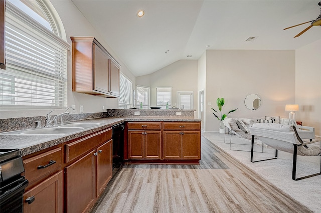 kitchen featuring vaulted ceiling, ceiling fan, sink, black dishwasher, and stove