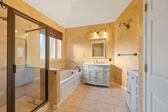 bathroom with separate shower and tub, vanity, vaulted ceiling, and tile patterned floors