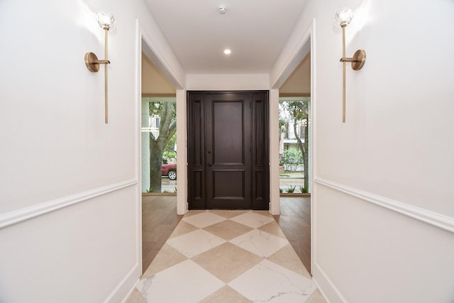 doorway to outside featuring plenty of natural light