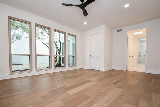 interior space featuring ceiling fan and light hardwood / wood-style flooring