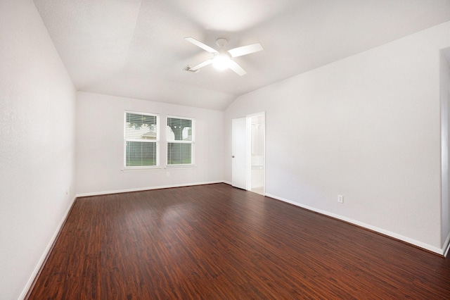 empty room with lofted ceiling, ceiling fan, and hardwood / wood-style flooring