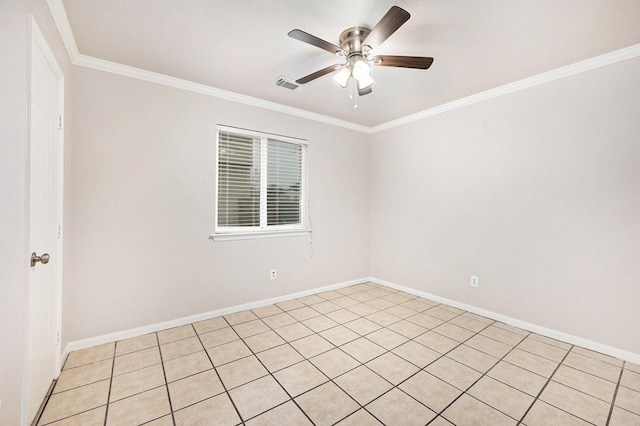 tiled spare room featuring ceiling fan and crown molding