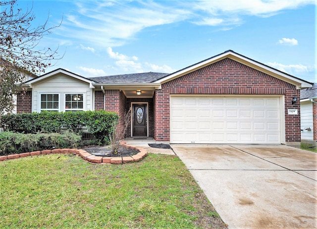 ranch-style home featuring a front lawn and a garage