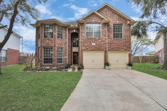 front of property featuring a front yard and a garage