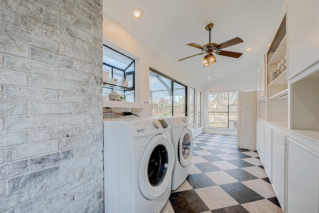 laundry area with washer and dryer, ceiling fan, and cabinets