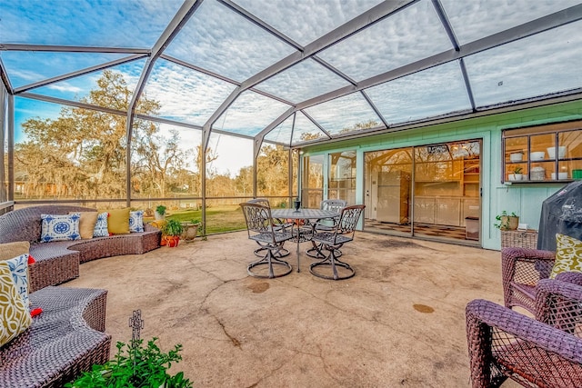 view of patio featuring an outdoor hangout area and a lanai