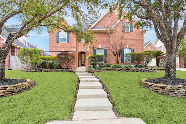 view of front of home with a front lawn