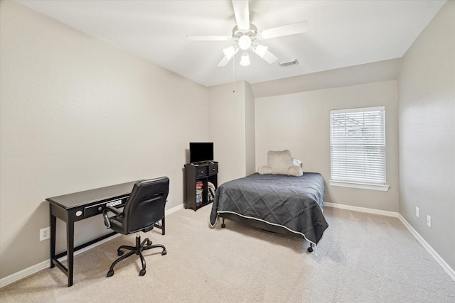 carpeted bedroom featuring ceiling fan