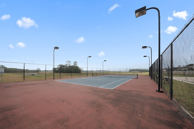 view of tennis court with basketball court