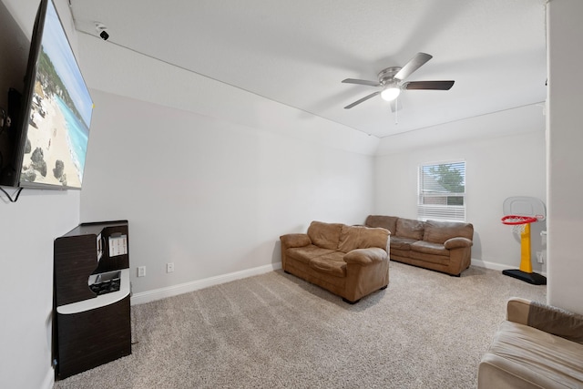 living room featuring carpet floors and ceiling fan