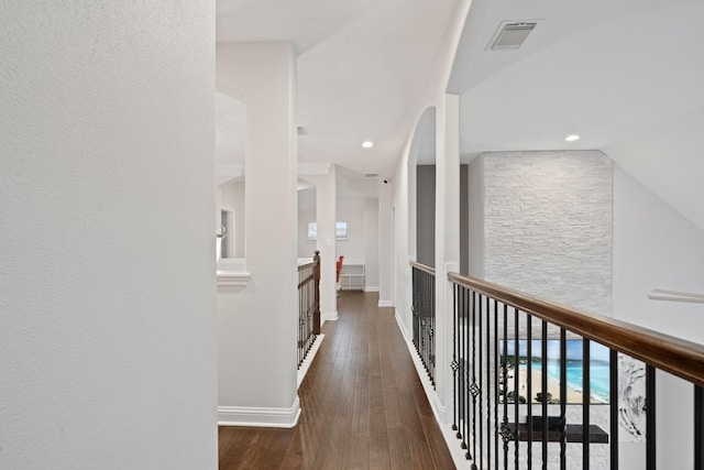 corridor with dark wood-type flooring